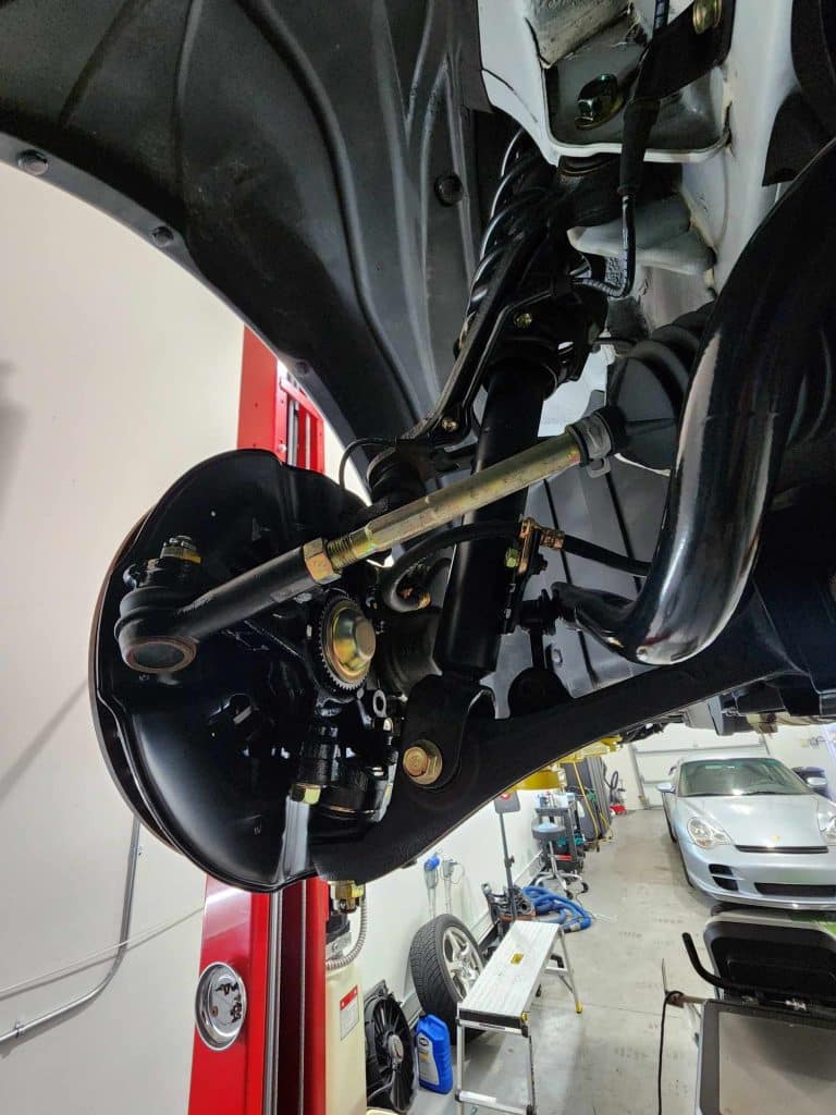 Close-up of car suspension in an auto workshop.