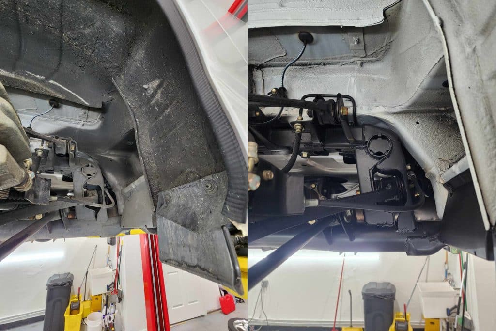 Underbody view of vehicle in workshop